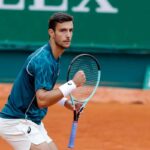 Lorenzo Musetti esulta con il pugno chiuso